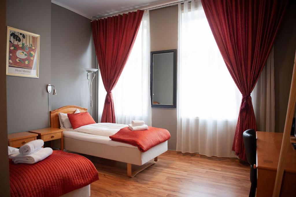 Henriks Hotell Skien Quarto foto